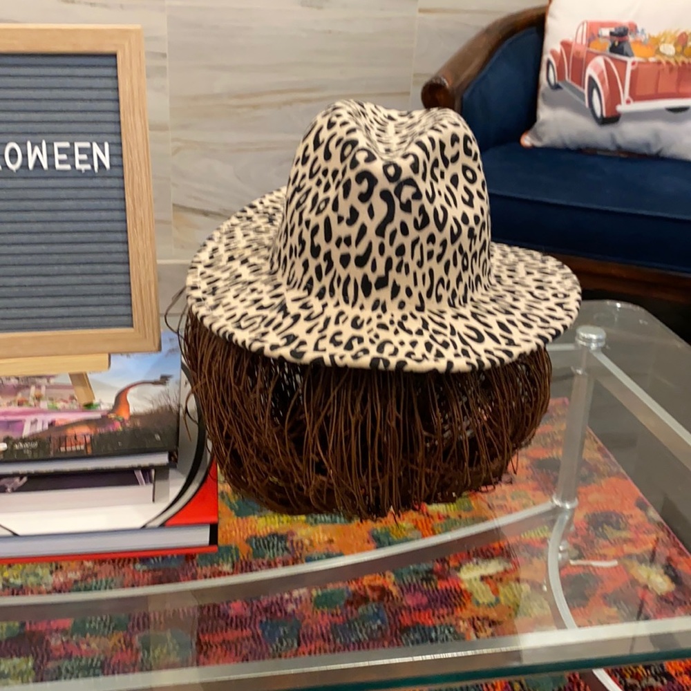 Cotton polyester mix leopard print hat. Super trendy.